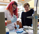 Bioengineering professor Valerie Daggett works with a student in her lab.