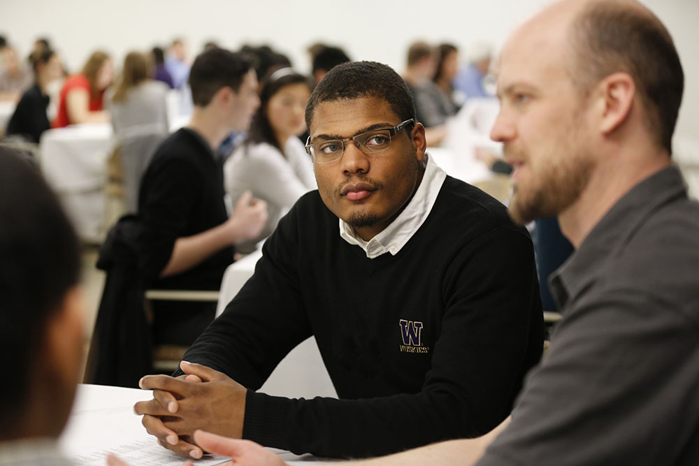 Student listening at a career event