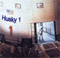 spacecraft with 'Husky 1' on it