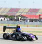 UW Formula SAE race car on the track