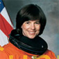 headshot of Bonnie Dunbar in astronaut suit