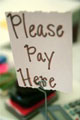 Pay here' sign