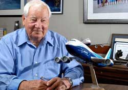 photo, Joe Sutter with 747 model
