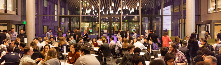photos of students talking to alumni