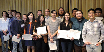 ChemE scholarship recipients holding certificates