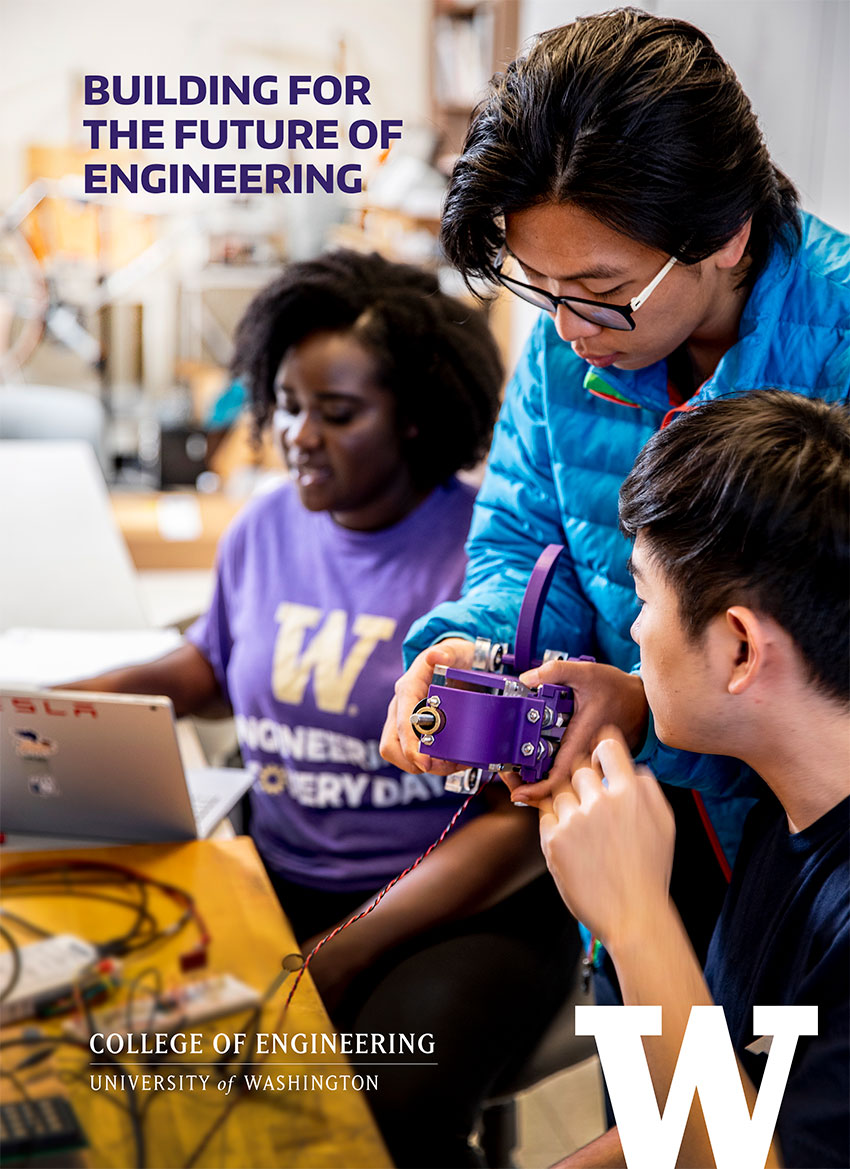 Three students working together in a lab