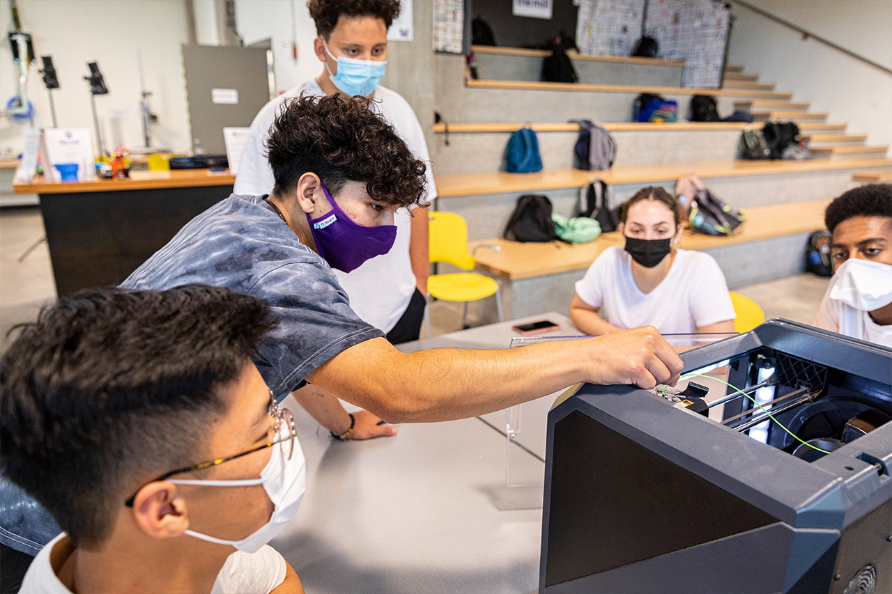 Students working on prototype at the MILL, a makerspace