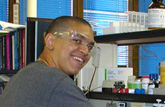student with goggles in lab student with goggles in lab