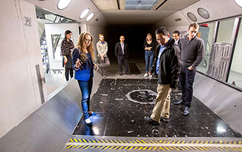 A group of people touring a lab