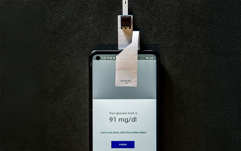 Cell phone showing sample being tested by app