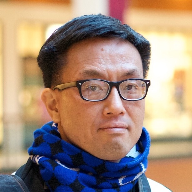 Headshot of Ken Yasuhara