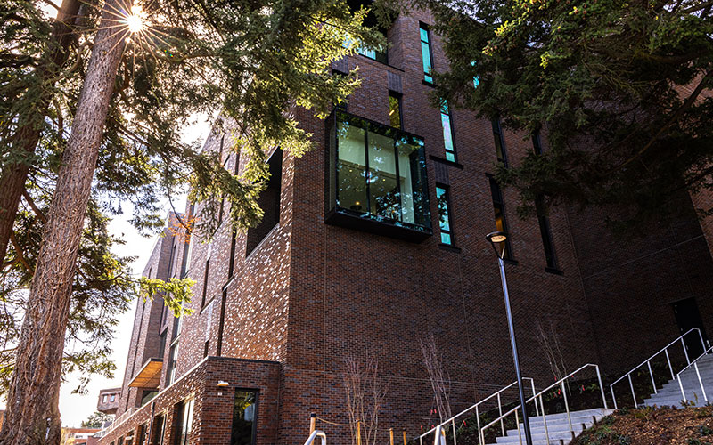 Exterior shot of the IEB, surrounded by trees and nature
