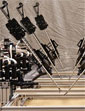 excerpt of photo of surgical robots that can be controlled remotely by a surgeon