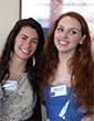 Two young women at a National Center for Women & Information Technology event