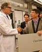 Gov. Inslee and Professor Dan Schwartz shake hands