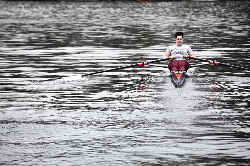 Sam Kolovson rowing on a lake