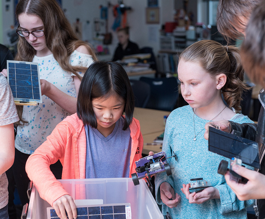 Students with electronics