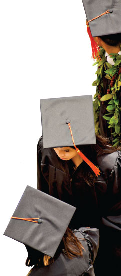 students in caps and gowns