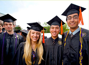 young graduates in caps and gowns