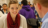 student and adviser talking in the Career Center