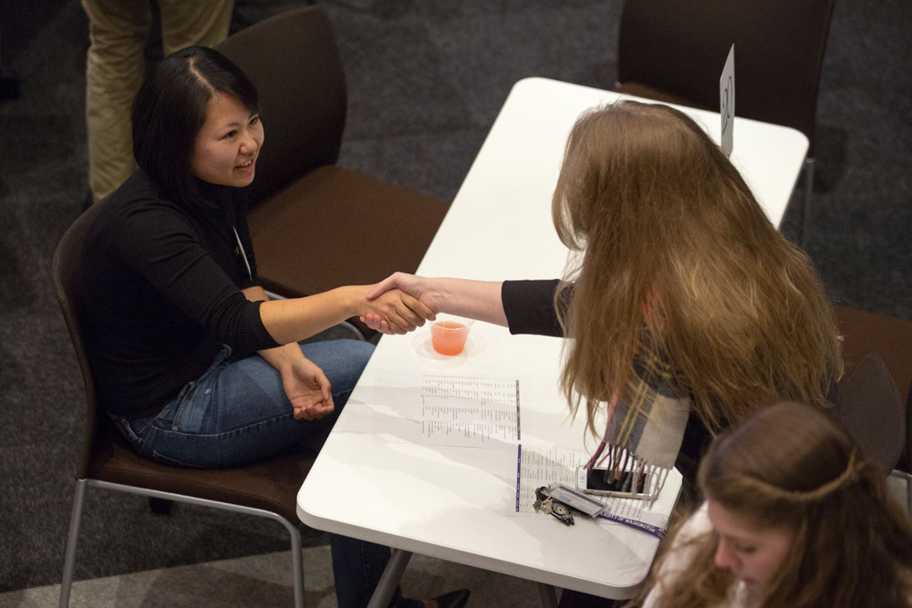 Student and employer shaking hands