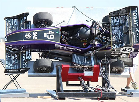 UW Formula SAE car on tilt test at Lincoln competition