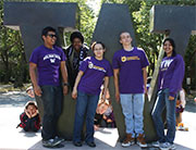 STEM Bridge students standing in front of giant W