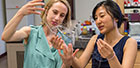 CSNE researchers examine flexible neural recording fibers. Photo credit: Justin Knight Photography/UW