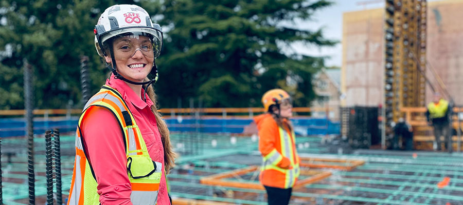 Student wearing helmet in construction area