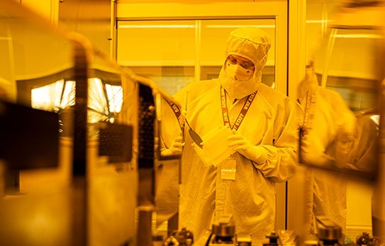Student working at lab wearing protective gear