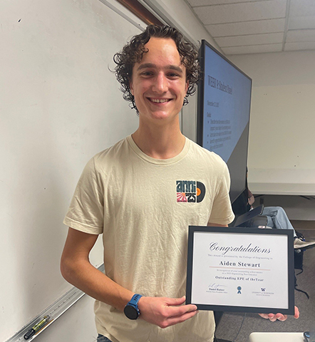 Aiden Stewart with award