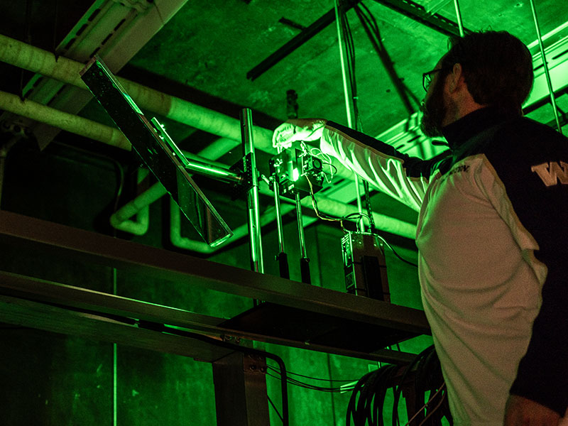 Student working on fusion energy development device