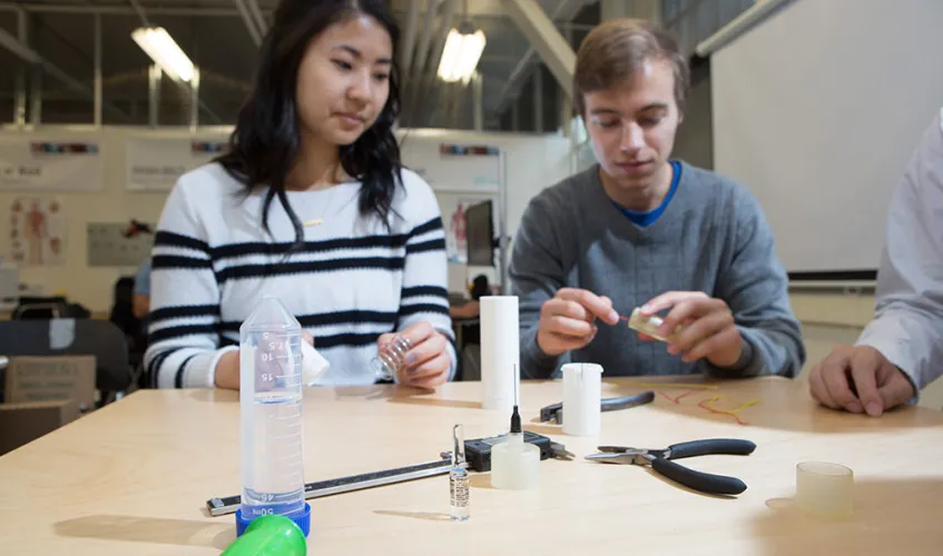 Students sitting a table