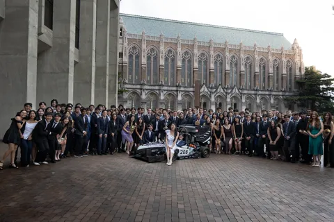 UW Formula Motorsports team posing in front of Suzzallo