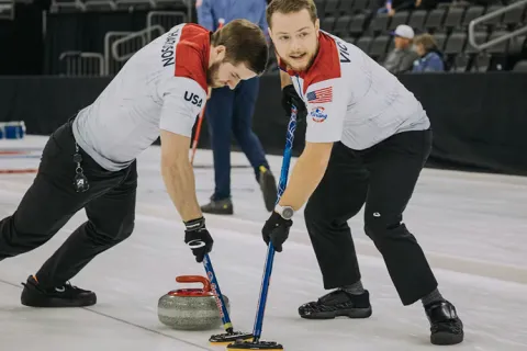 Two curling atheletes
