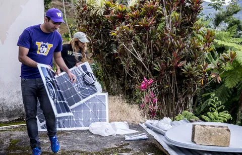 Engineers installing solar panels