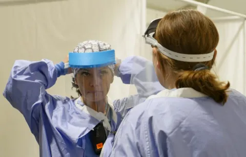 two women in scrubs