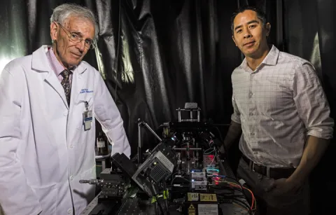 UW researchers with 3-D microscope