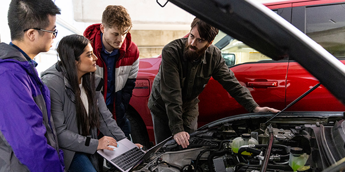 Students working together on electric vehicle