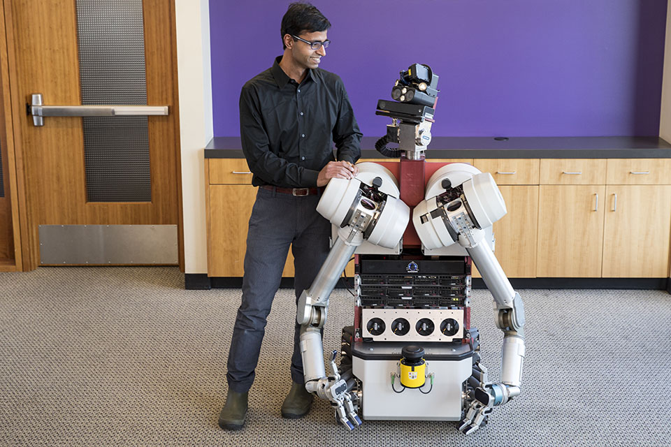 a man with a robot