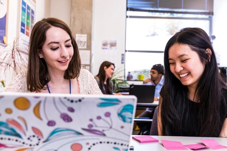 Two women working together at a study lab