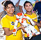 students holding a small robot