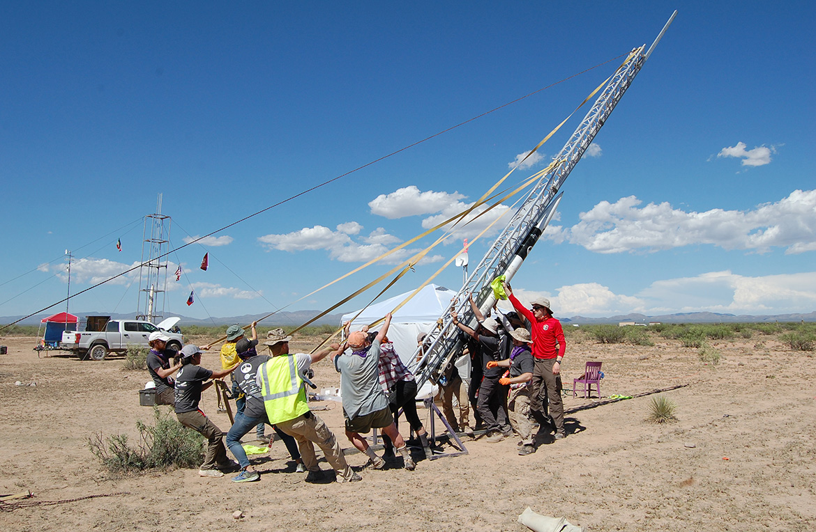 the team hoists the rocket