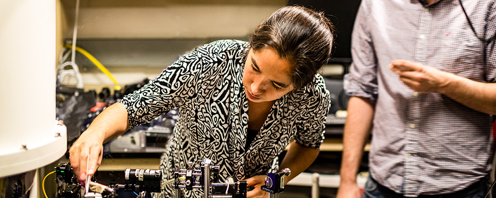 Kai-Mei Fu working in a lab