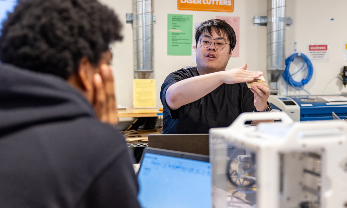 Engineering Design Coach teaching a milling workshop.