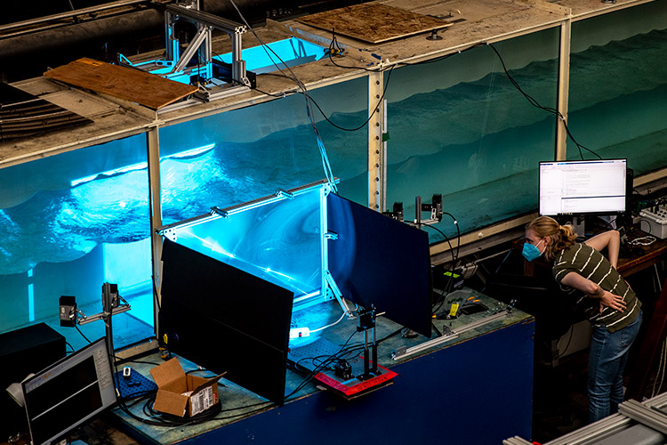 The UW Harris Hydraulics Laboratory: there is a very large tank with cameras pointing at it from the outside and many monitors to track movements within it