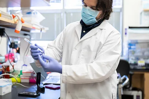 Research scientist Enos Kline, pictured here in the Lutz Lab in March 2020