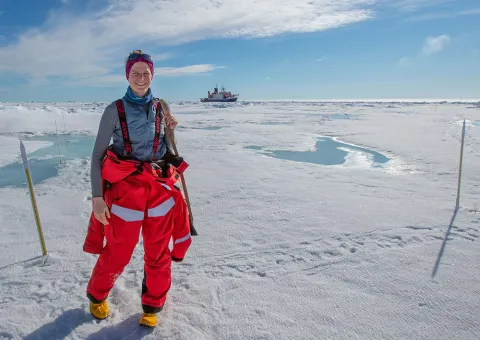 CEE alumna Madison Smith standing in the Arctic