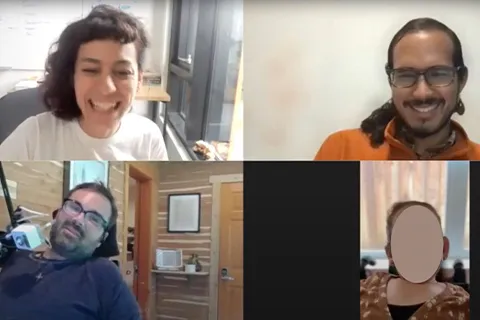 A screenshot shows Patrícia Alves-Oliveira, Amal Nanavati, a participant and Tyler Schrenk smiling for a photo. Alves-Oliveira is wearing a white shirt and is sitting in a classroom. Nanavati is wearing an orange shirt and his background is blurred. The participant is wearing a brown shirt and is sitting in front of a window. Schrenk is wearing a blue shirt and sitting in front of a wood-paneled background. 