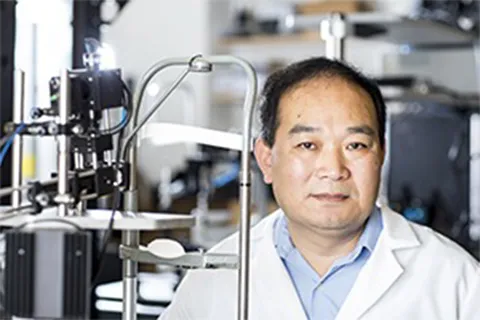 Ruikang Wang headshot in a lab